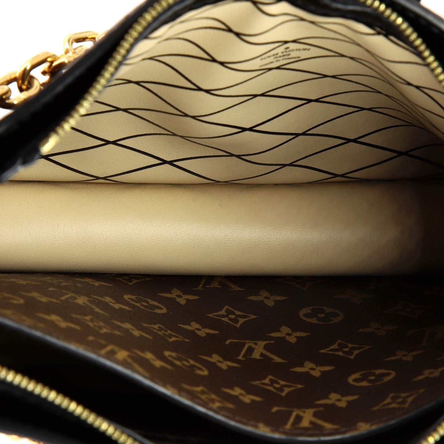 Trunk Clutch Reverse Monogram Canvas