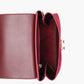 Burgundy suede mini top-handle bag