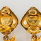 Boucles d'oreilles dorées Chanel