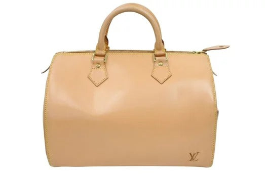 Louis Vuitton Speedy Nomad Handbag