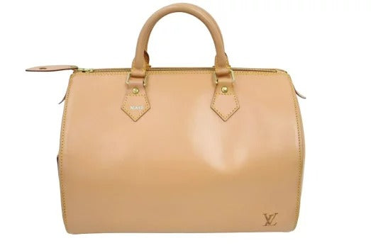Louis Vuitton Speedy Nomad Handbag