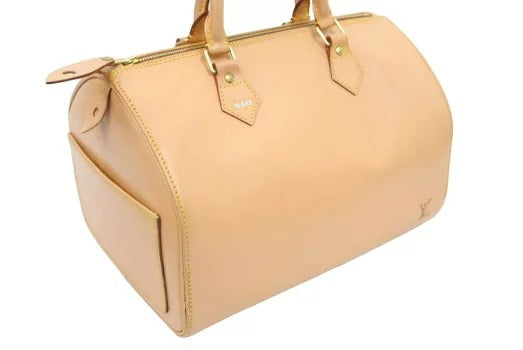 Louis Vuitton Speedy Nomad Handbag