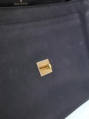 Louis Vuitton Lock Me MM Handbag