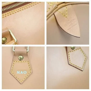 Louis Vuitton Speedy Nomad Handbag