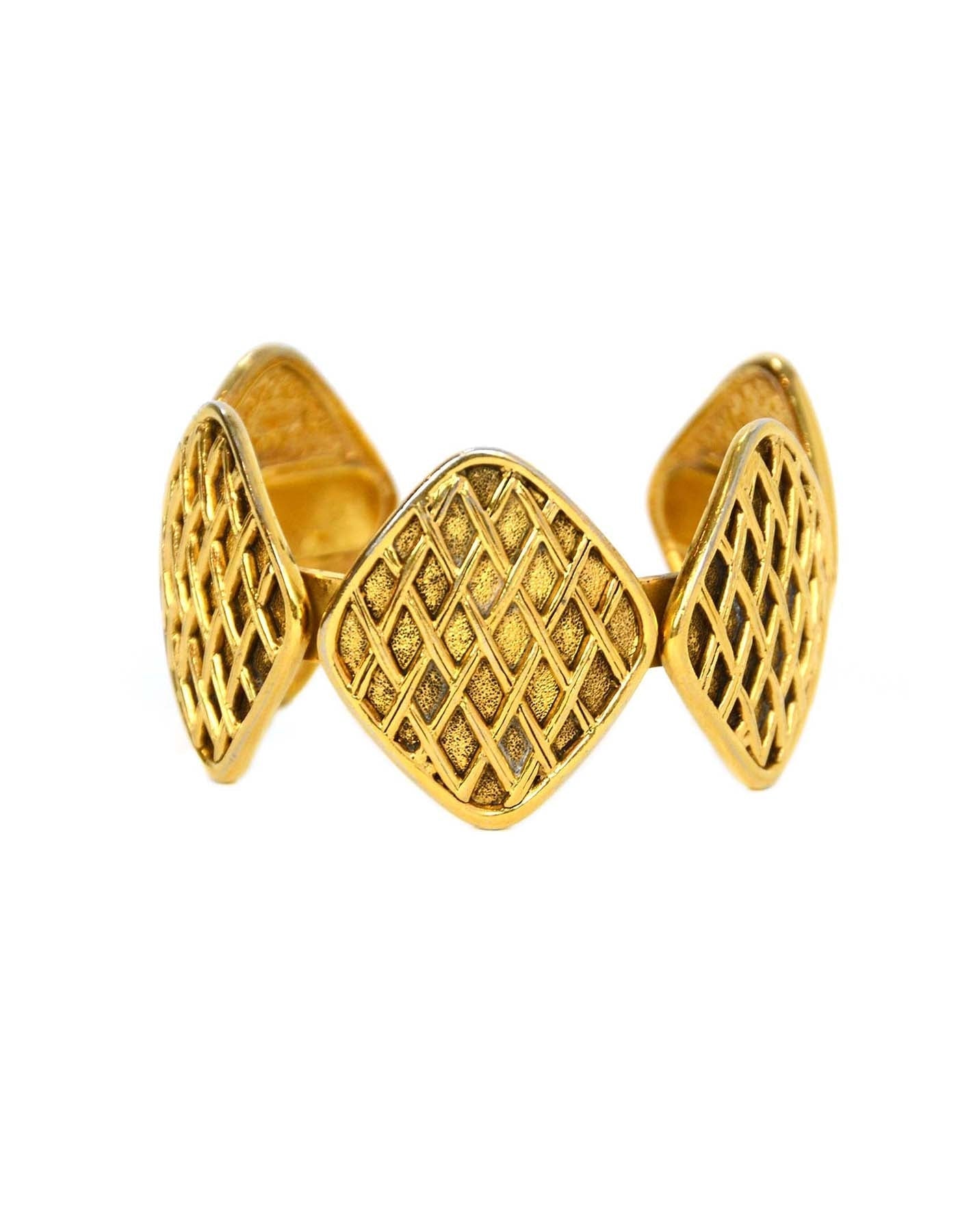 Chanel   '90s Gold Quilted Medallion Cuff Bracelet