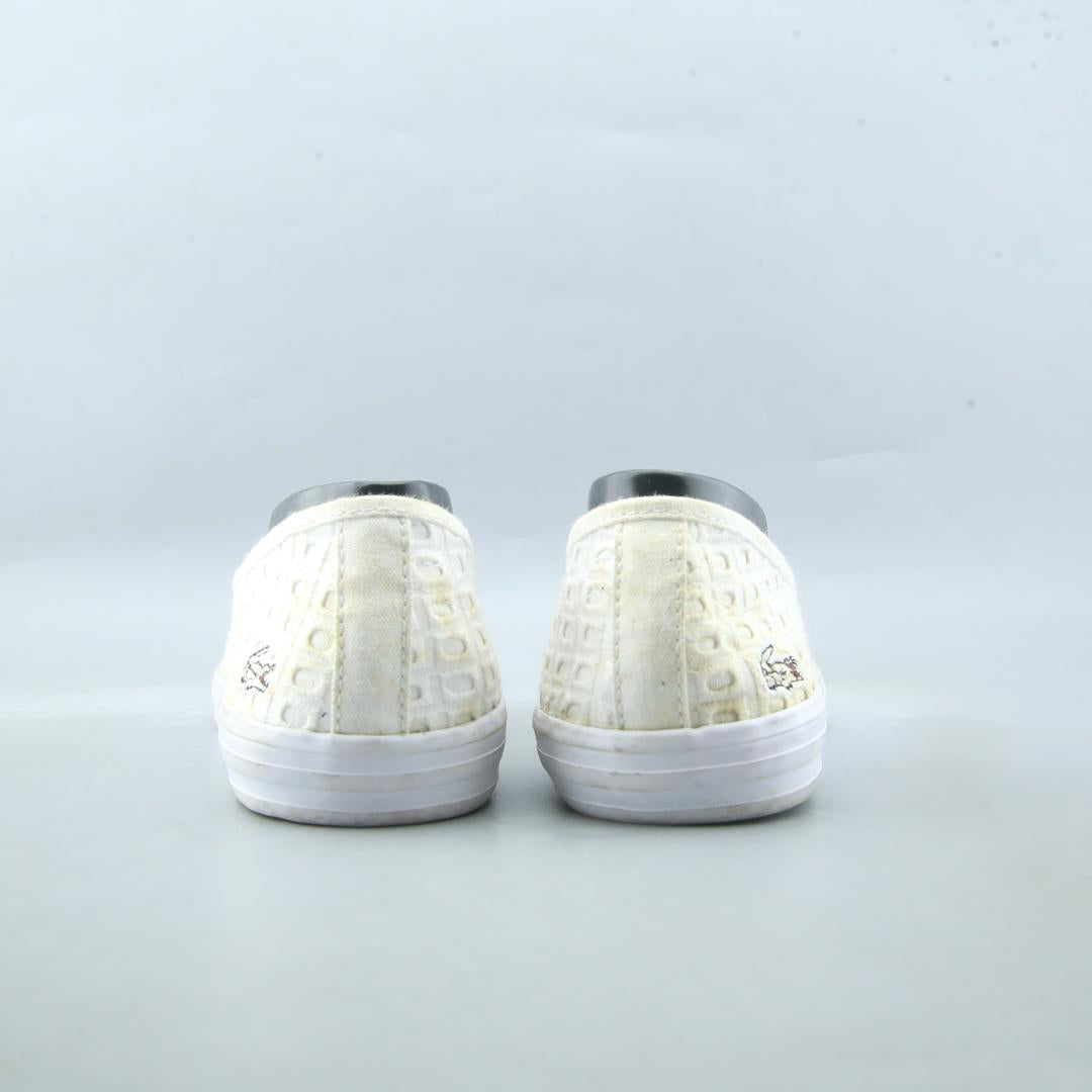 LACOSTE .