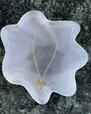 Dior   Gold Tone Beige Enamel Logo Charm Necklace