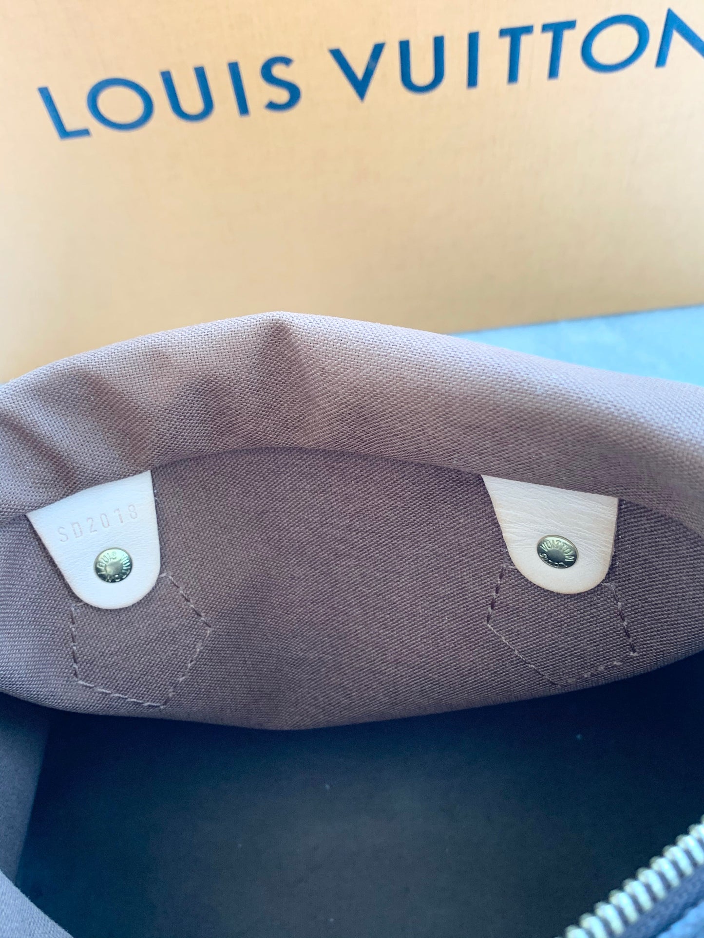 [ ] Louis Vuitton Speedy 25 Monogram Satchel Bag