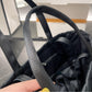 Black leather woman Chanel handbag