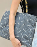 Chanel   Black Bag in Quilted Canvas Logo Print with Gold Hardware