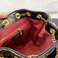 Black Chanel woman handbag