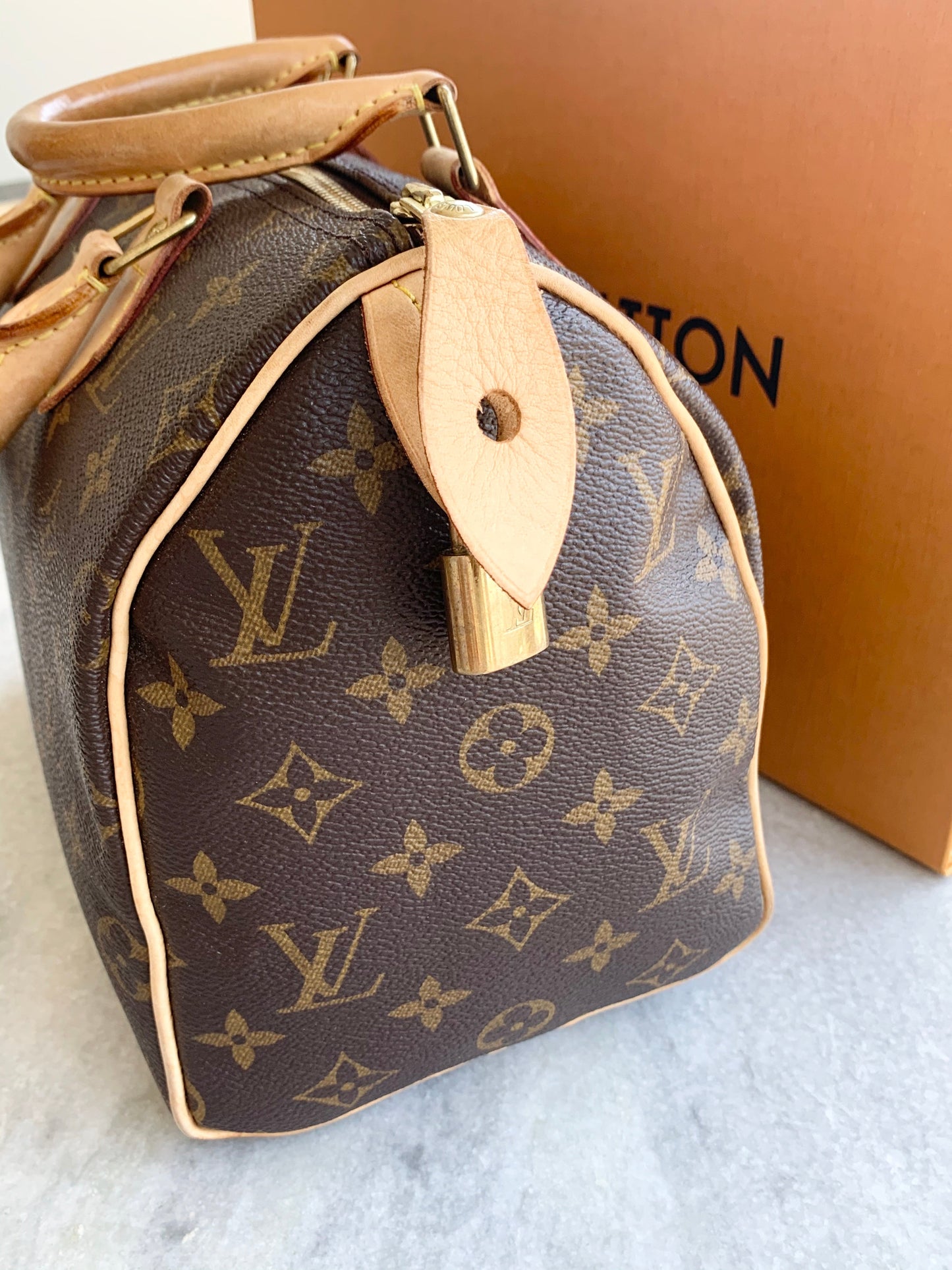 [ ] Louis Vuitton Speedy 25 Monogram Satchel Bag