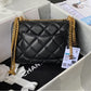 Black/gold Chanel woman handbag
