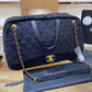 Large woman Chanel handbag