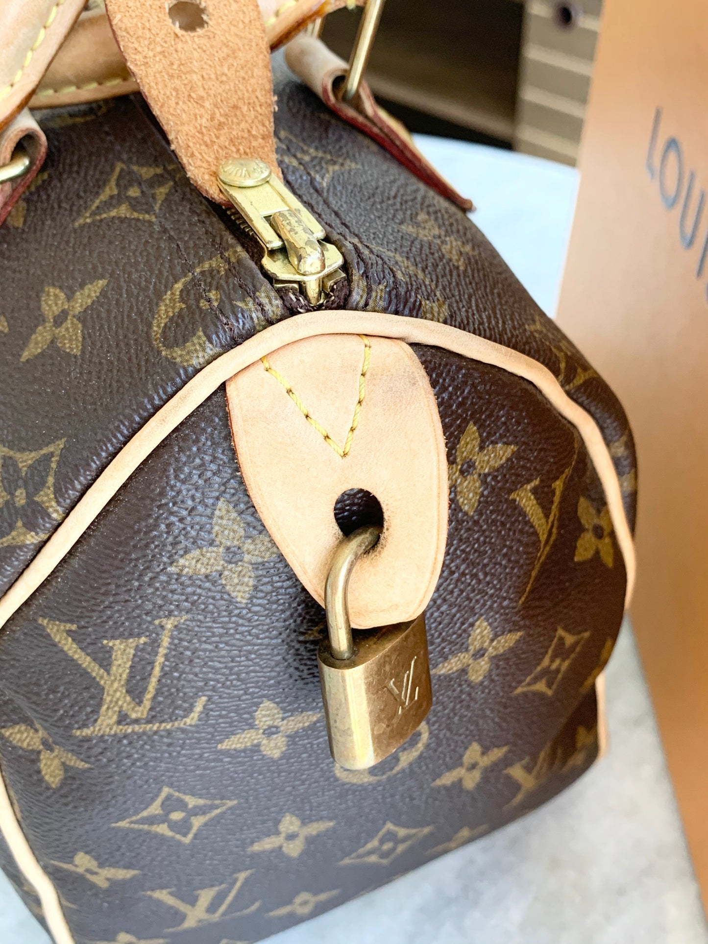 [ ] Louis Vuitton Speedy 25 Monogram Satchel Bag
