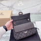 Woman Chanel shoulder handbag