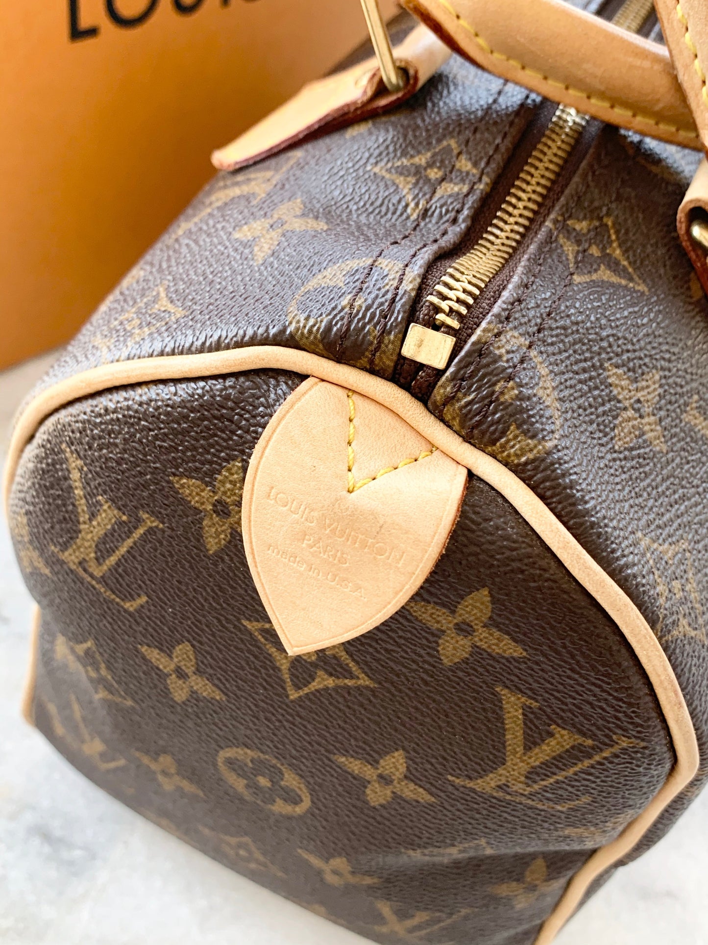[ ] Louis Vuitton Speedy 25 Monogram Satchel Bag