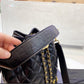 Black Chanel woman handbag