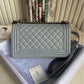 Woman Chanel shoulder handbag