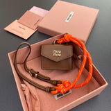 MICRO BAG 7 IN TAWNY BROWN SMOOTH LAMBSKIN ORANGE STRAP Amelia Bags