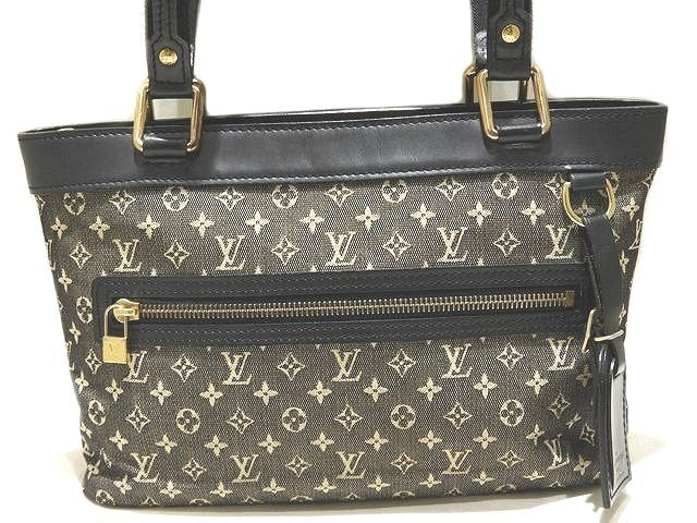 Louis Vuitton Lucile Monogram Mini Canvas Leather Handbag