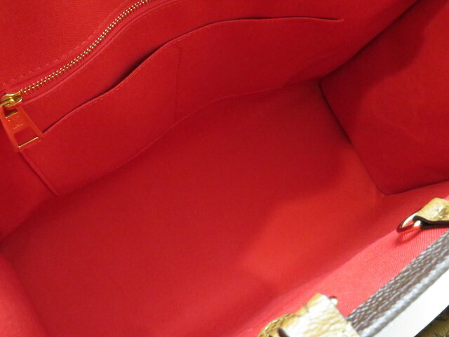 Louis Vuitton On The Go GM Monogram Giant Reverse Handbag