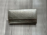 Dior gold wallet