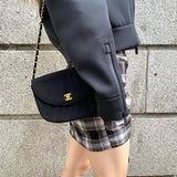 CHANEL   24k gold cloth shoulder bag