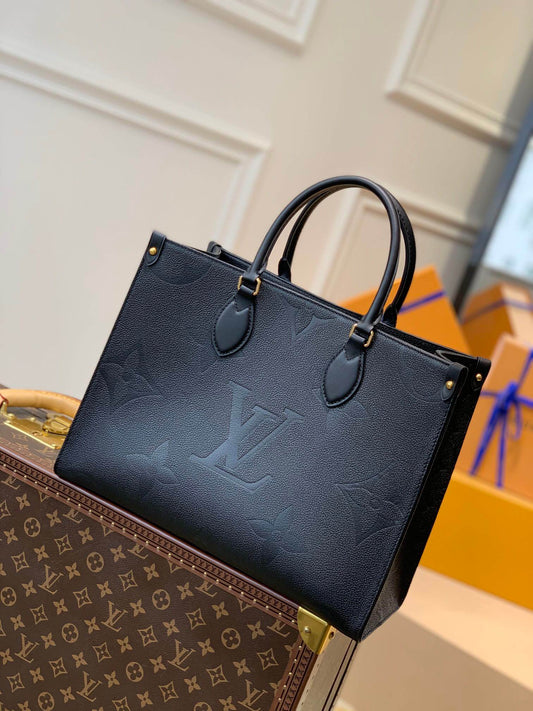 M45595 OnTheGo MM Monogram Empreinte leather black Giant Monogram