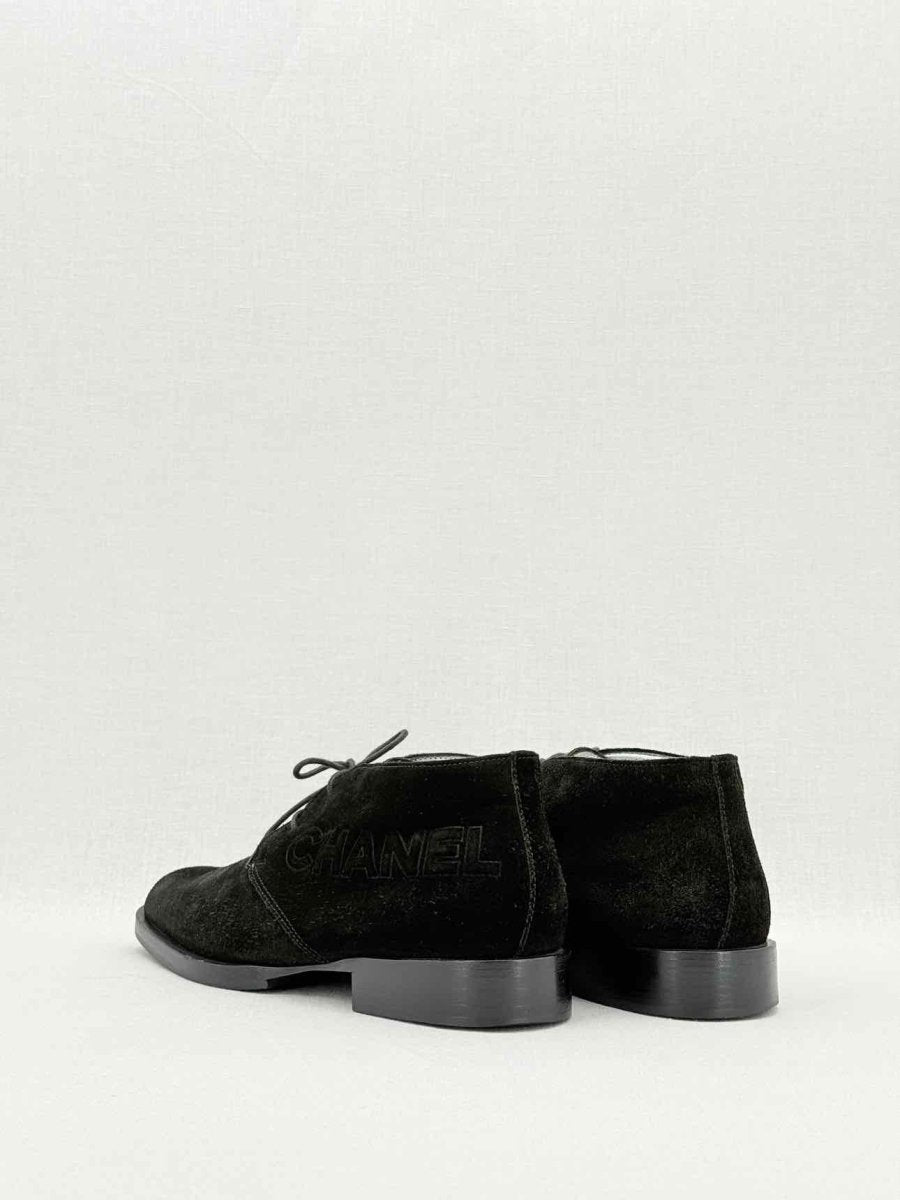 CHANEL Black Size EU 38 Ankle Boots